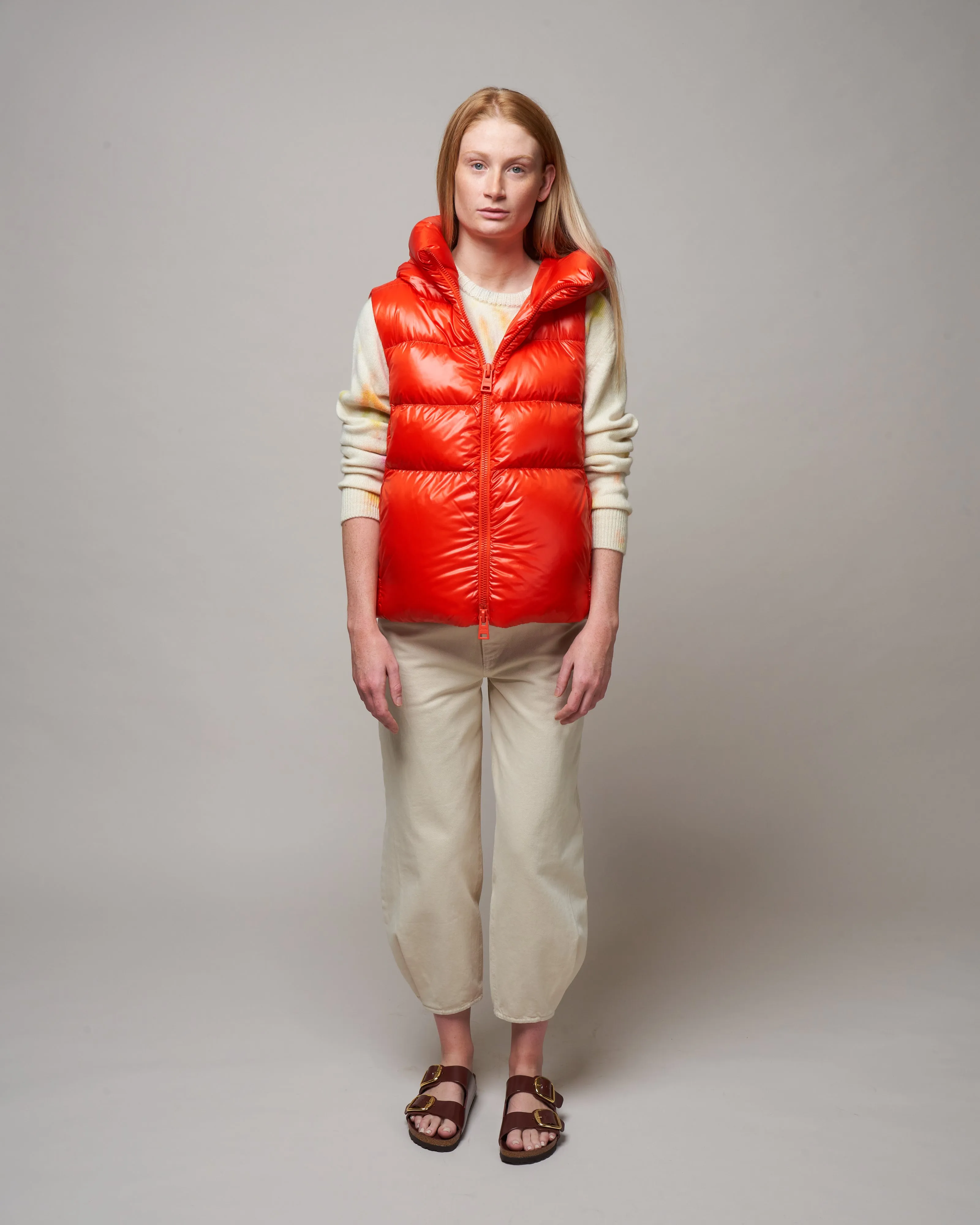 globe- biodegradable hooded vest - spicy orange