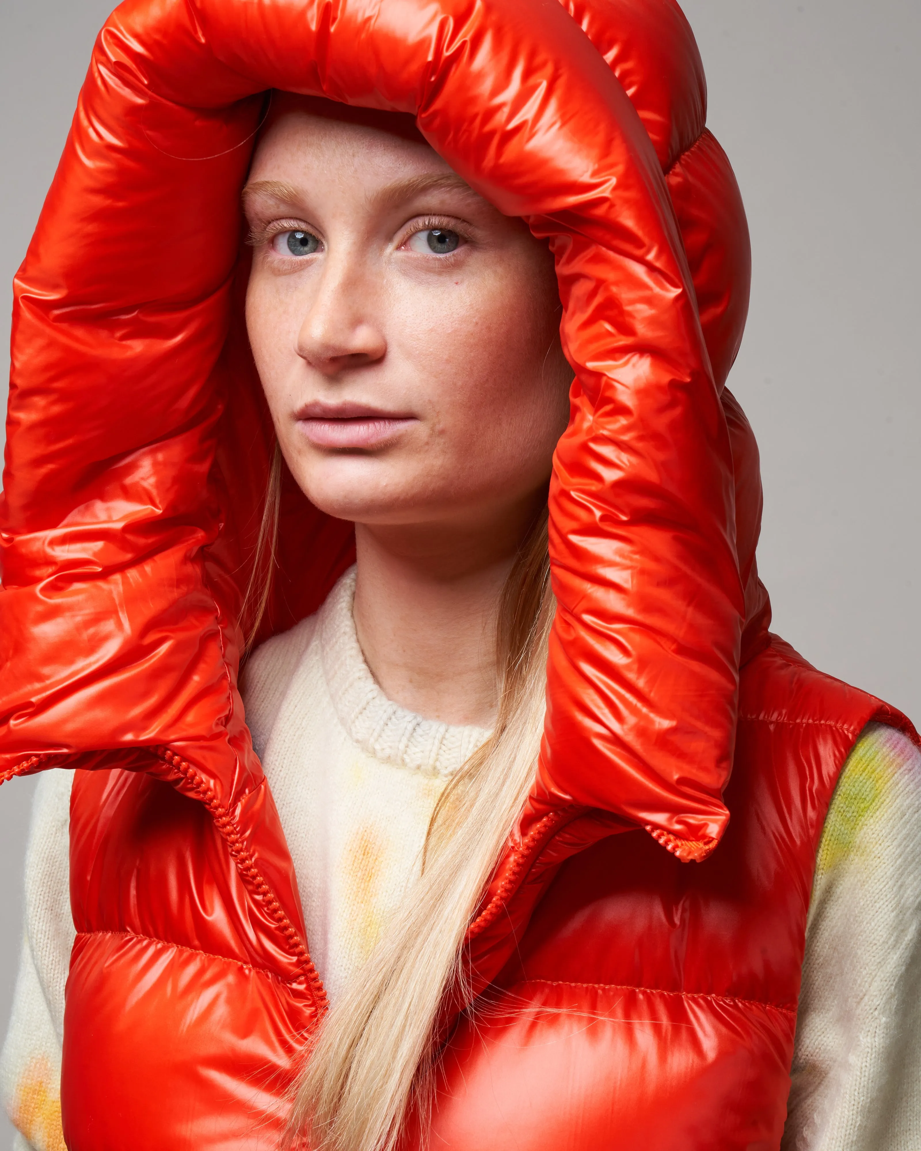 globe- biodegradable hooded vest - spicy orange